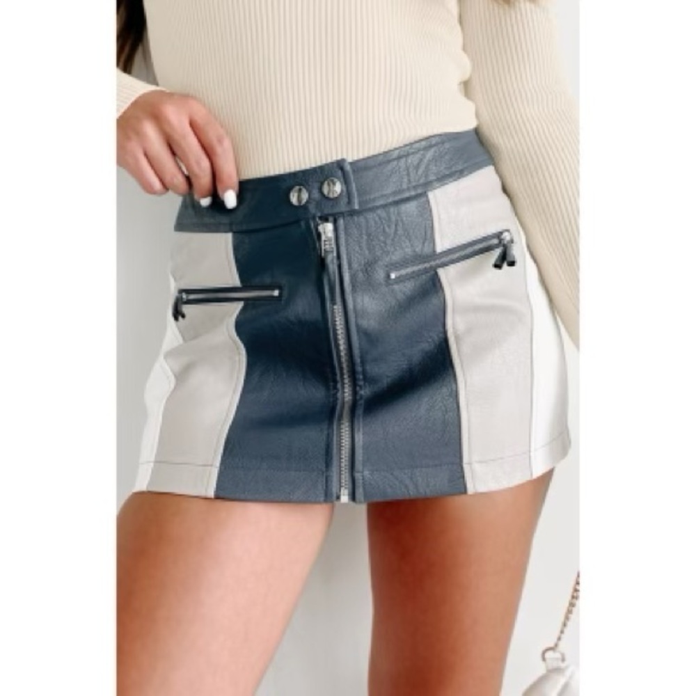 NWT Faux Leather Mini Skirt 
Size: Small 
Condition: New with tags! Never worn